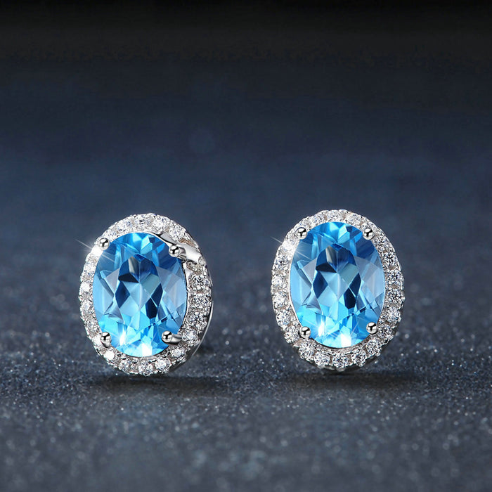 Blue Topaz Halo Earrings